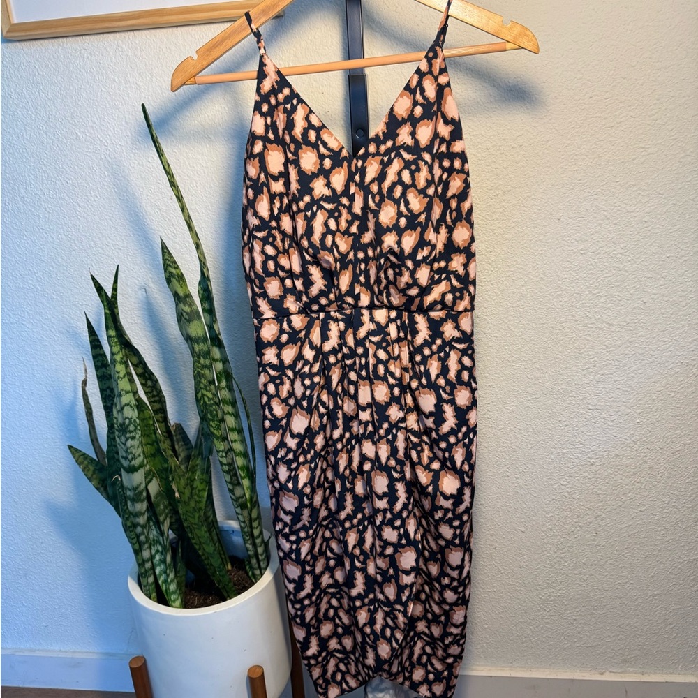 Printed dress, tulip hem, pink and navy leopard spot.